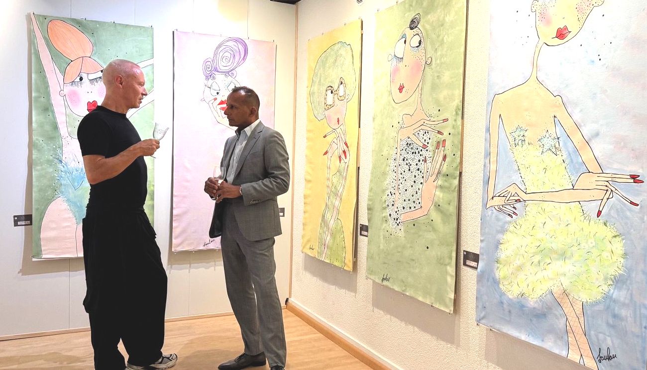 Visitors and artworks in the gallery space